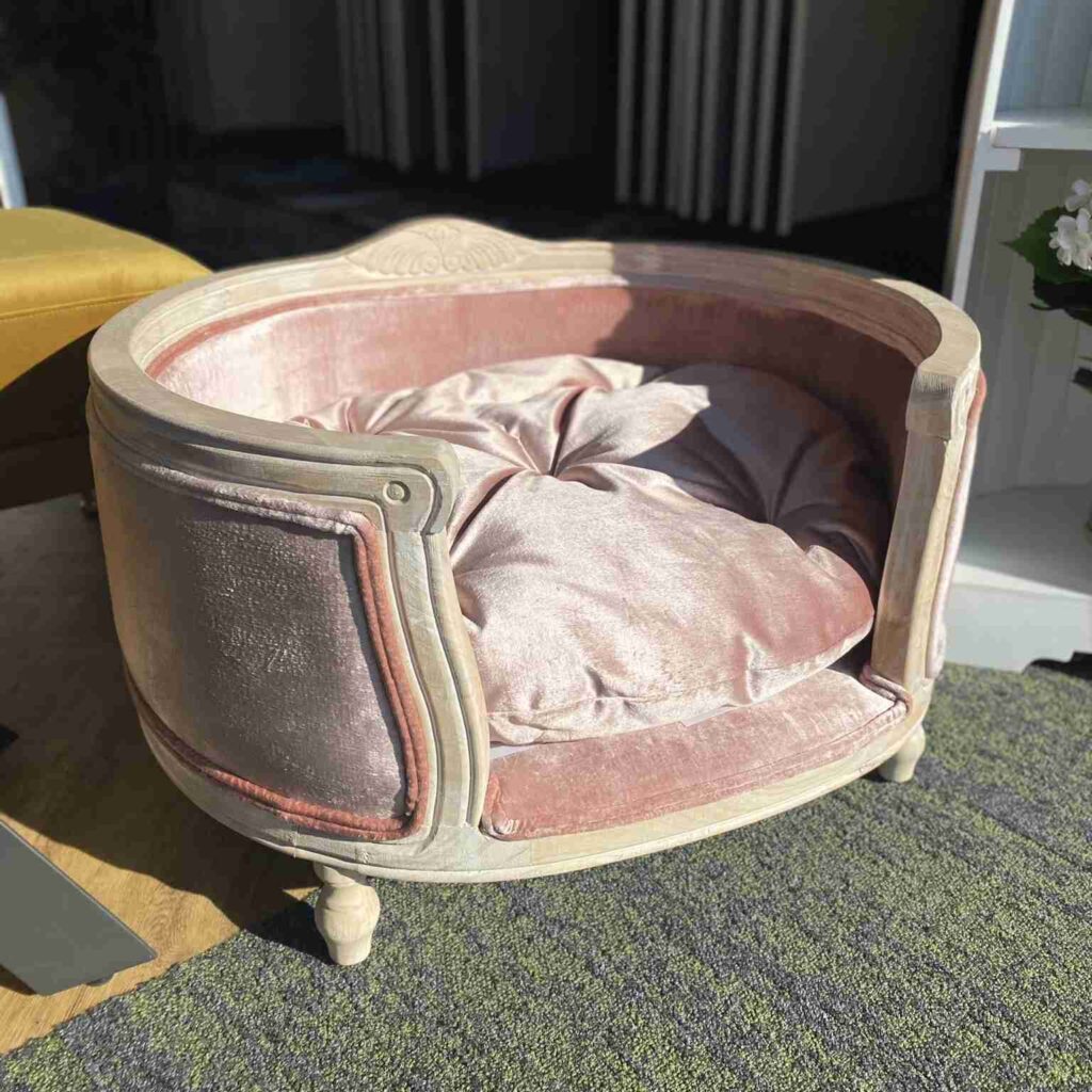 Pink velvet pet bed giving your pet a stylish comfortable spot